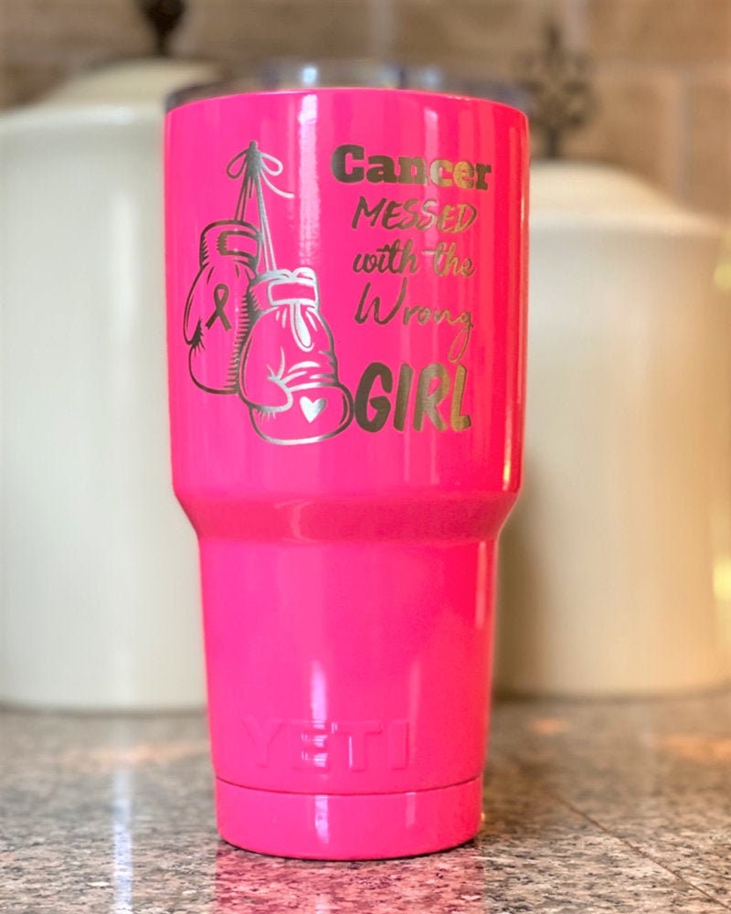 Hot pink 30oz YETI tumbler engraved with Cancer Messed With the Wrong Girl and boxing gloves design