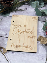 Personalized Cards of Christmas Past card storage book engraved with Naquin Family name