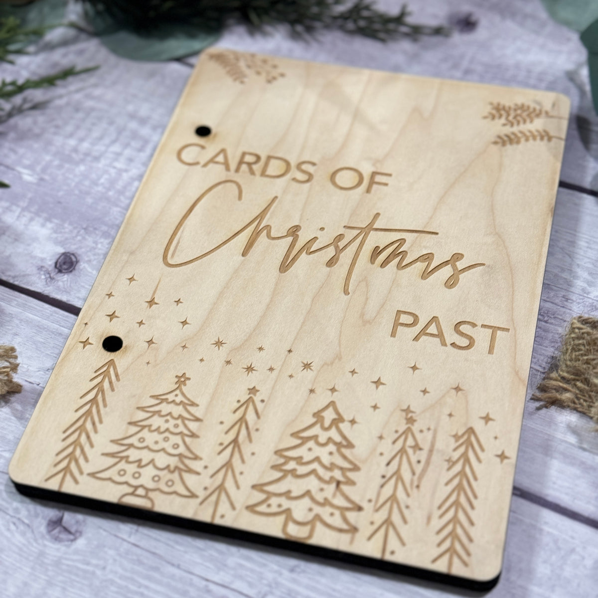 Engraved plywood Cards of Christmas Past card keeper cover with Christmas tree design, flat lay