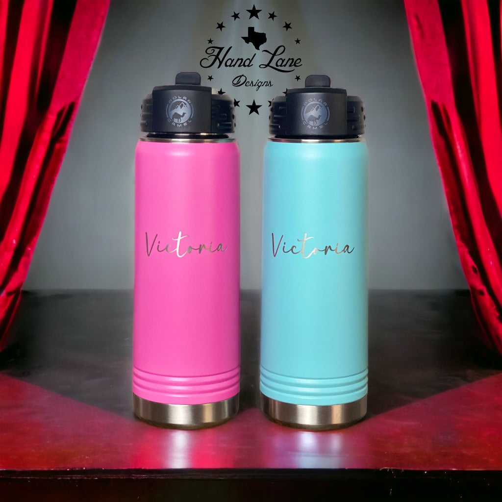 Pink and teal 20 oz custom engraved water bottles with Victoria in script and flip straw lids