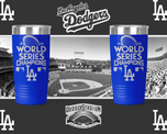 Two royal blue tumblers engraved 2020 World Series Champions LA Dodgers shown against a Dodger Stadium backdrop