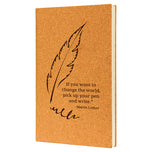 Cork journal engraved with a feather quill and Martin Luther quote about picking up your pen to change the world