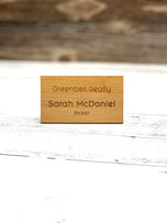 Single alder wood name badge engraved with broker name and title, standing upright