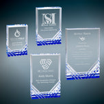 Four sizes of Mirage blue acrylic awards with sample engraved corporate recognition designs