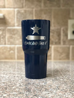 Navy blue 30oz tumbler engraved with Houston Astros star and Come and Take It cannon design on kitchen counter