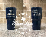 Navy powder coated 30oz tumbler shown both sides with Houston Astros Come and Take It cannon and Never Settle engravings