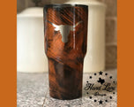 Burnt orange grunge powder coated tumbler laser engraved with Texas Longhorns logo