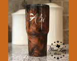 Back view of burnt orange grunge Texas Longhorns tumbler with custom name Abi engraved in script