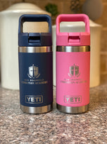 Navy and pink 12oz YETI bottles laser engraved with New Braunfels Christian Academy school crest