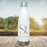 White powder coated 17oz water bottle laser engraved with Seint Team Cashmere logo, outdoor scene