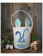 Blue bunny ears Easter basket personalized Luke with blue bunny egg design, rustic wood backdrop